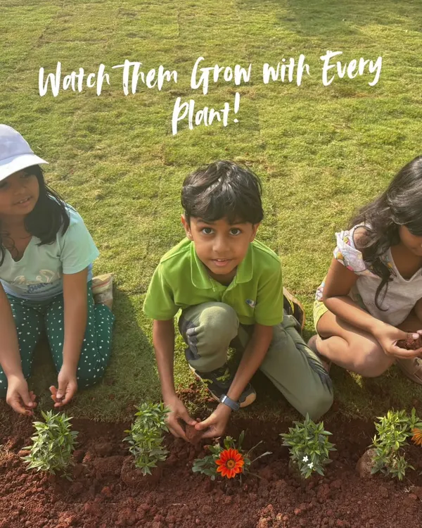 There's no better way for children to learn about nature than by getting their hands in the soil. Here, I'm guiding young gardeners as they plant flowers, teaching them about growth and responsibility in a fun, hands-on way.
