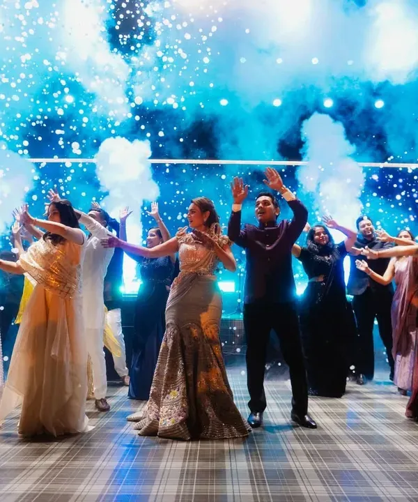 A high-energy sangeet performance complete with CO2 jets and a dynamic stage setup. We design our events to be full-sensory experiences, ensuring the entertainment is as spectacular as the decor.