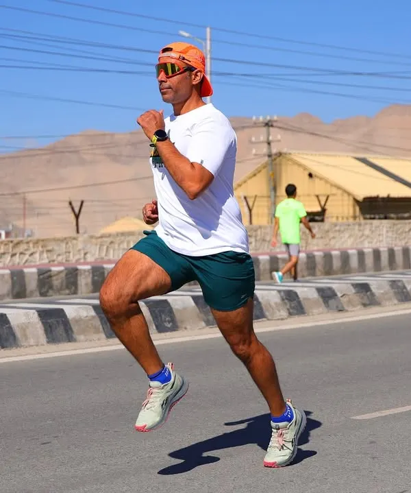 This is what it feels like to push your limits at the roof of the world. As a coach, I don't just prepare you for the distance; I prepare you for the environment. This shot from the Ladakh Marathon captures the essence of high-altitude race training and the incredible strength you'll build with us.