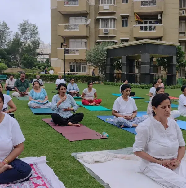 Celebrating International Yoga Day with an outdoor session in Indrapuram. Practicing in nature adds a special element of peace and connection to our yoga.