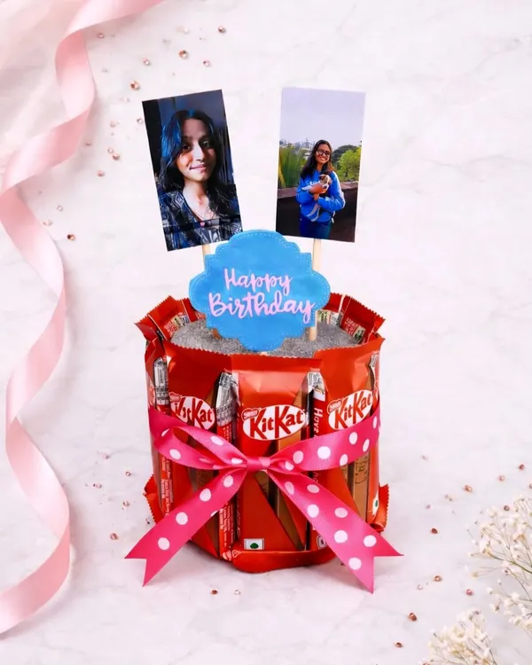 A birthday cake made of chocolate! This KitKat cake is one of my most popular items. I add personalized photo toppers and a "Happy Birthday" sign to make it a fun and delicious surprise.