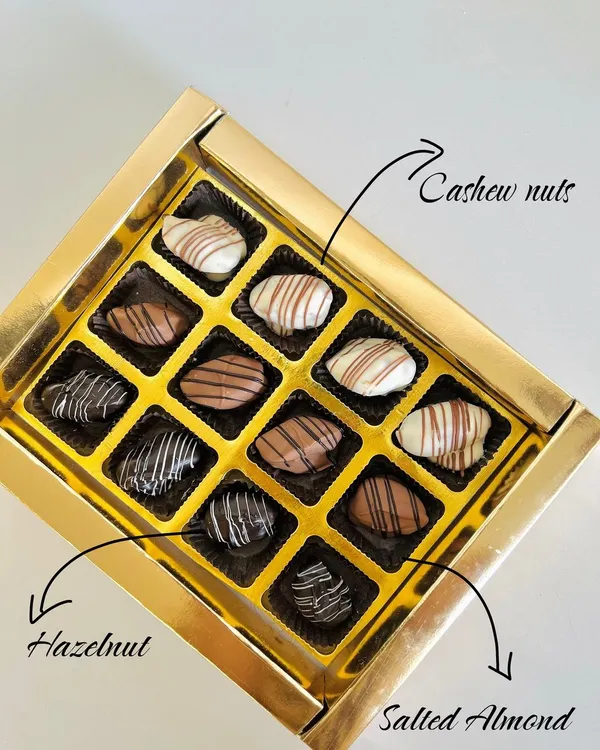 A closer look inside my assorted Diwali chocolate box. This one features three delicious varieties: creamy cashew, rich hazelnut, and a sweet and salty salted almond.