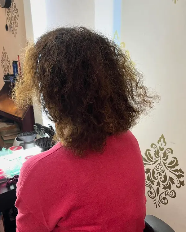 Before the cut. Melina's hair was ready for a reshape to bring out its best.