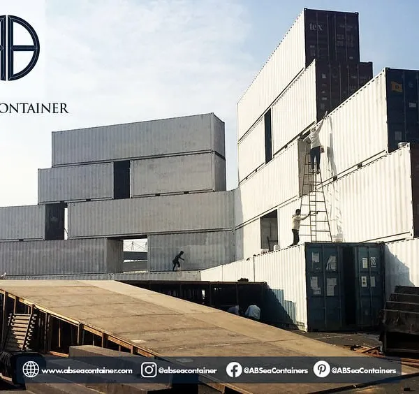 This image shows the assembly of a massive, multi-story container structure for an event at the Buddh International Circuit. Our team is experienced in stacking and securing containers for large, temporary installations.