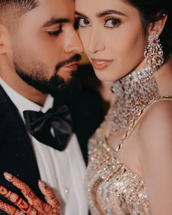 A glamorous and intimate close-up from an engagement night. We focus on the deep connection and sparkling chemistry between the couple.