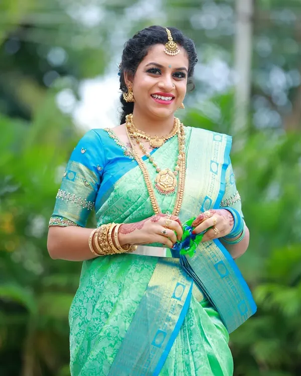 This is the perfect look for a family wedding. I created a soft glam look with defined eyes and a natural base for Kavya, making her feel beautiful and confident for her cousin's big day.