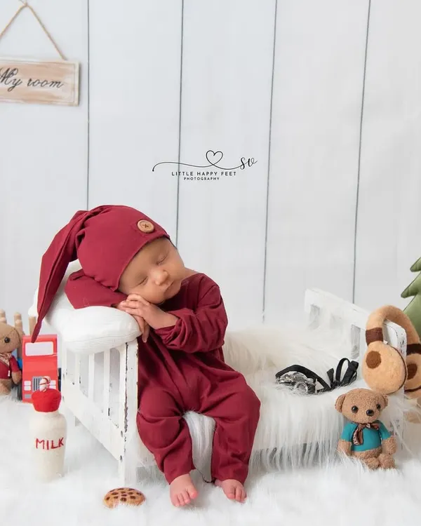 Welcome to my room! This adorable setup features a tiny bed, toys, and a personalized sign, creating a miniature version of a child's bedroom.
