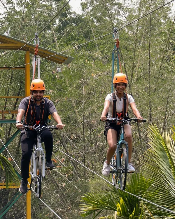 See the world from a new perspective as you pedal through the treetops on our sky cycling course. It's a breathtaking experience that combines adventure with stunning views of the surrounding greenery.