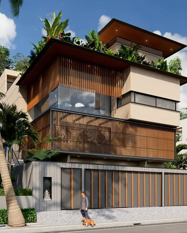 The 18th Avenue House in Chennai, designed as a response to the tropical climate. The layered form, with its wooden louvers and green terraces, is a result of site context, Vastu principles, and our goal to create a seamless indoor-outdoor connection.