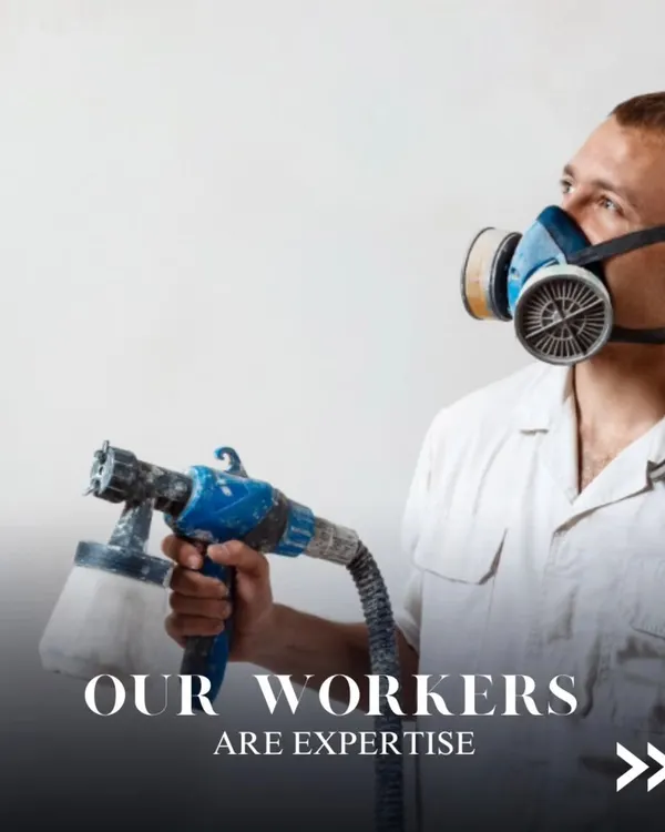 Our painters are experts in their craft. This image shows a professional using a spray gun, one of the tools we use to achieve a perfectly even and efficient finish on large surfaces. We always wear appropriate safety gear.