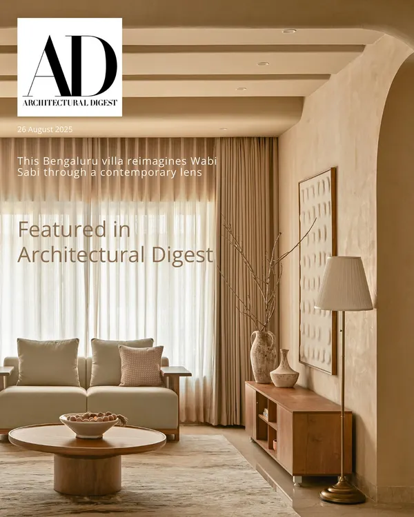 This living room, part of a Bengaluru villa featured in Architectural Digest, embodies my philosophy of creating 'art homes'. It showcases a wabi-sabi inspired design, using a calm, earthy palette, natural light, and textured walls to create a space that is both luxurious and deeply serene.