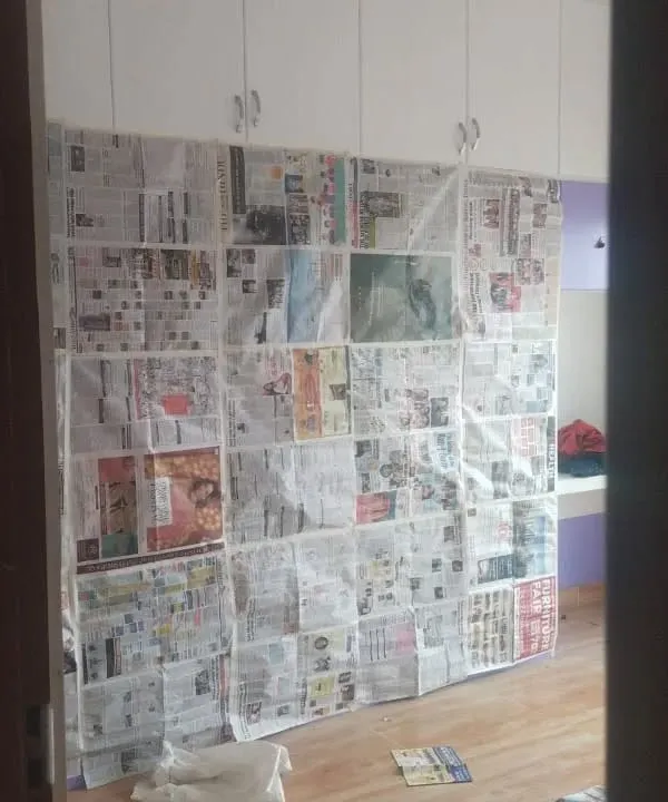 Before starting work on this large wardrobe, I carefully covered the entire surface with paper to protect it from any dust or paint splatter.