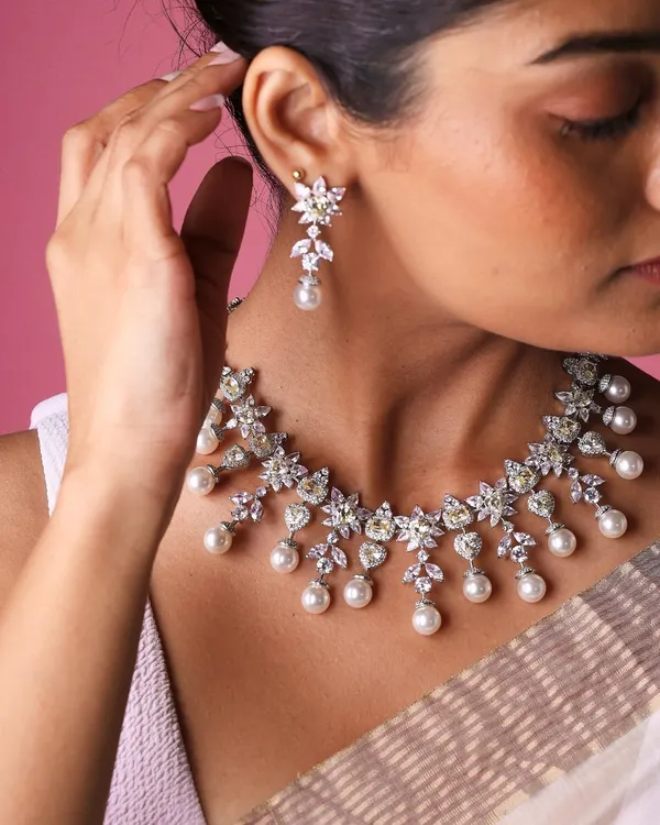 This is what a modern heirloom looks like. I designed this bridal set to feel both grand and gracefully light, combining the sunny warmth of yellow sapphires with the timeless elegance of South Sea pearls and brilliant diamonds. It’s a complete look that tells a story of joy.