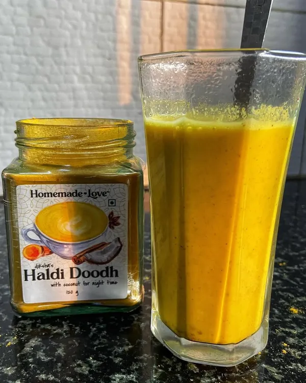 A warm, inviting glass of our Haldi Doodh, ready to be enjoyed. This image showcases our instant turmeric milk mix, a perfect blend of health and taste for a soothing beverage.