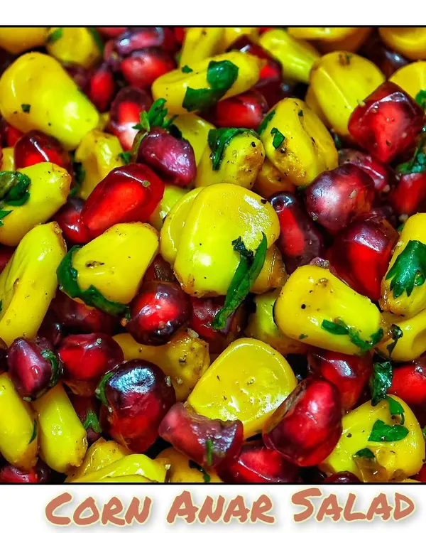 A vibrant and healthy Corn Anar Salad. The sweetness of corn and pomegranate seeds is balanced with a light dressing, making it a refreshing side dish in my Friday meals.