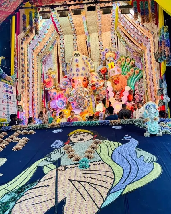 This is one of my most ambitious projects, a grand Ganesh pandal decorated entirely with art made from currency notes. This large-scale installation shows my capability to handle unique, complex, and high-value thematic decorations for public festivals.