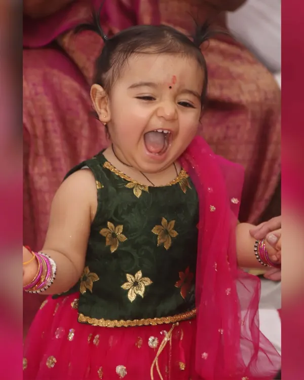 The pure joy of celebration. I focus on capturing these real, unposed moments of happiness that you'll treasure forever, like this little one's infectious laugh at a family function.
