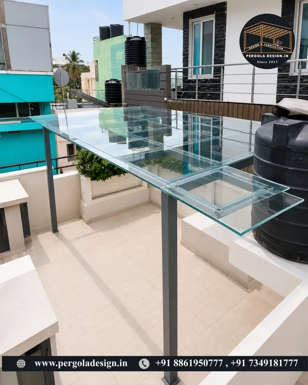 The final result of a sleek terrace transformation. This toughened glass pergola provides complete rain protection while keeping the space bright and open, showcasing a modern and minimalist aesthetic.