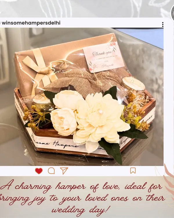 A charming wedding hamper designed to bring joy. This hexagonal basket is filled with handpicked items and adorned with beautiful sola wood flowers, making it a perfect token of love for the newlyweds.