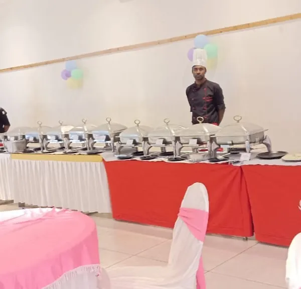 A full buffet setup for a birthday party at Prestige Ferns Residency, complete with live counters. Our team is ready to serve, ensuring a smooth and enjoyable event for everyone.