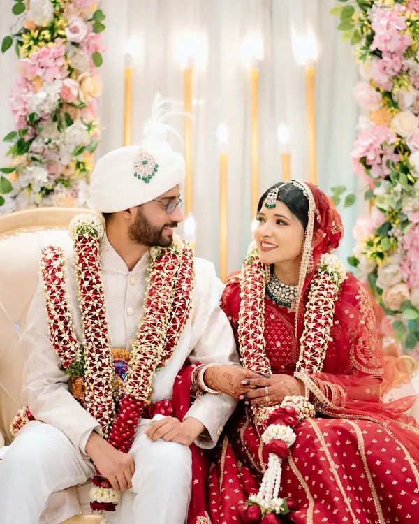 A beautiful candid moment between the bride and groom during their Nikah ceremony. The way they look at each other tells the whole story.