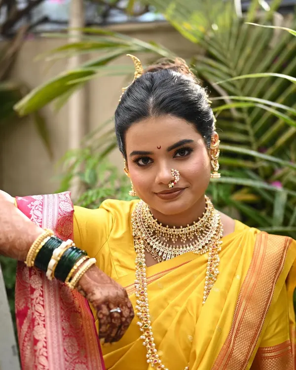 This is the look I live for: a radiant bride who is confident and glowing from within. I achieved this timeless Maharashtrian bridal style with a flawless, dewy base that lasts, soft glam makeup to enhance her features, and a perfectly draped Nauvari saree.
