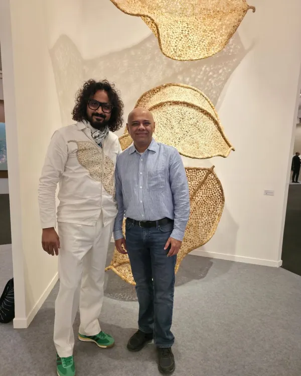 In conversation with a visitor at the India Art Fair in front of my 'Biography' installation. These interactions are invaluable, as they allow me to share the story of the work directly and hear people's personal responses.