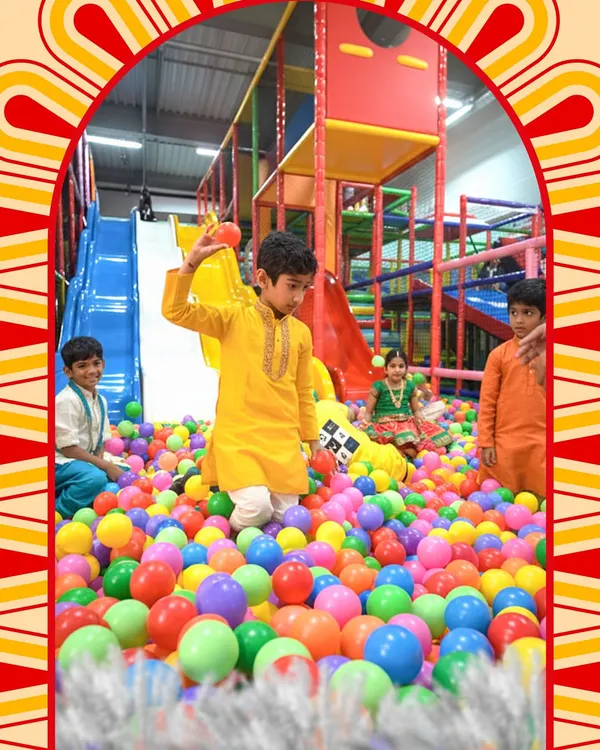 Celebrating Durga Puja with festive spirits in our ball pit. It's wonderful to see kids enjoying the holidays in their traditional attire.
