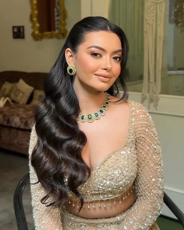 A close up of classic Hollywood waves. This style is all about shine, structure, and volume. I style each wave carefully to create this uniform, glamorous effect that is perfect for an evening event like a cocktail party.