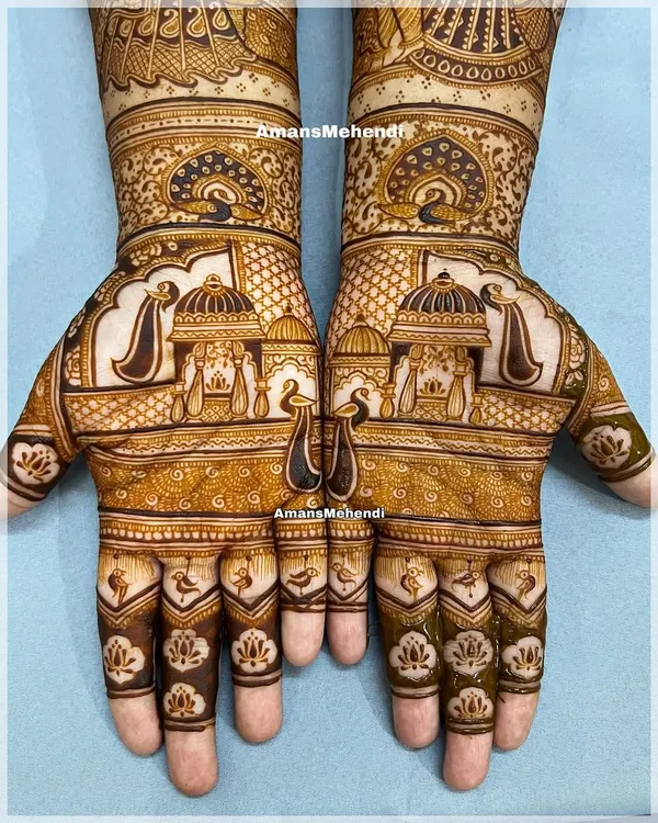 This symmetrical bridal design is a story told on two hands, featuring palace architecture and majestic peacocks. It represents the grand, traditional style I love to create for a bride's special day.