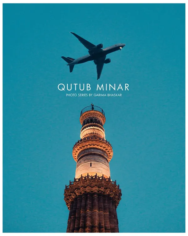 A perfectly timed shot of an airplane flying over the Qutub Minar at dusk. This photo series combines a modern element with a historic monument to create a unique and striking image of Delhi.