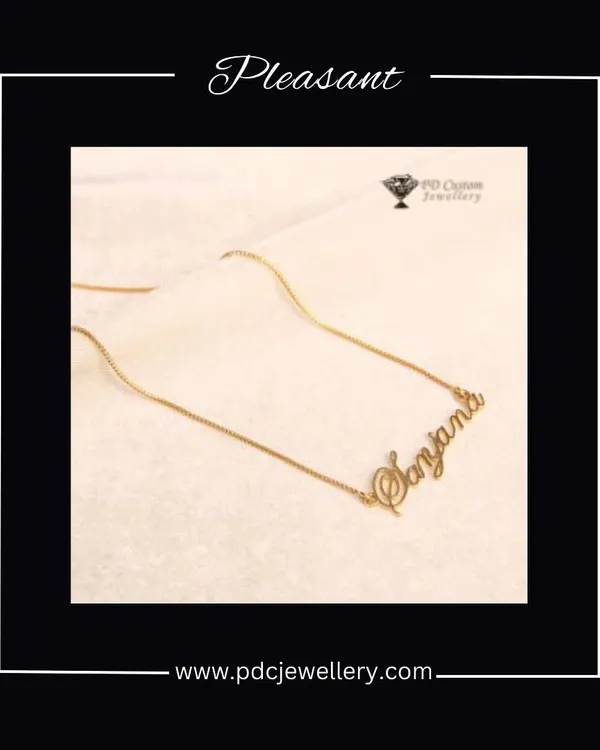 Get your own custom name chain. This image shows a "Sanjana" nameplate necklace in a beautiful script, a truly personal and pleasant gift.