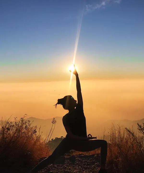 This is what it feels like to practice above the clouds. Here in the Himalayas, we find our strength and connect with the vastness of nature, using the Reverse Warrior pose to open our hearts to the sky.