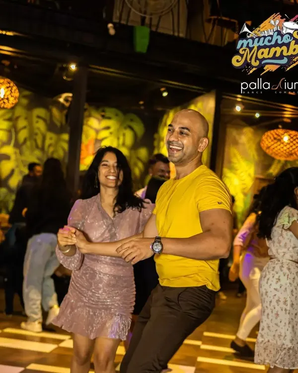 The pure joy of social dancing captured at our 'Mucho Mambo' event. Our goal is to get you comfortable and confident enough to hit the dance floor and create fun moments like this one.