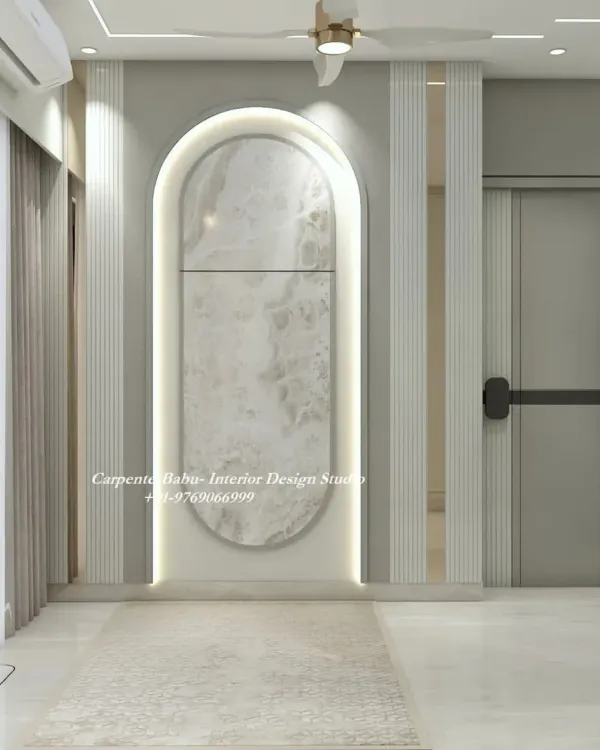 An elegant wall design featuring a large, arched niche with a marble finish, set against a backdrop of vertical fluting. The backlighting adds a soft, ambient glow.