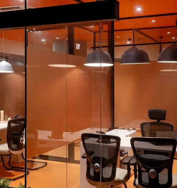 This office's south zone features energizing orange hues, a choice made in collaboration with the design team to boost productivity. As a Vastu consultant, I guide the use of color theory to align with the space's energy and the company's goals.