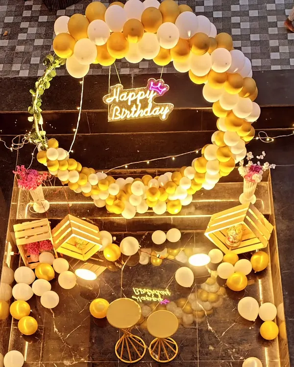 We specialize in creating stunning focal points for your celebration, like this custom birthday setup. The combination of a circular balloon arch in elegant gold and white, paired with a glowing neon "Happy Birthday" sign, creates a perfect photo-ready moment for any party.