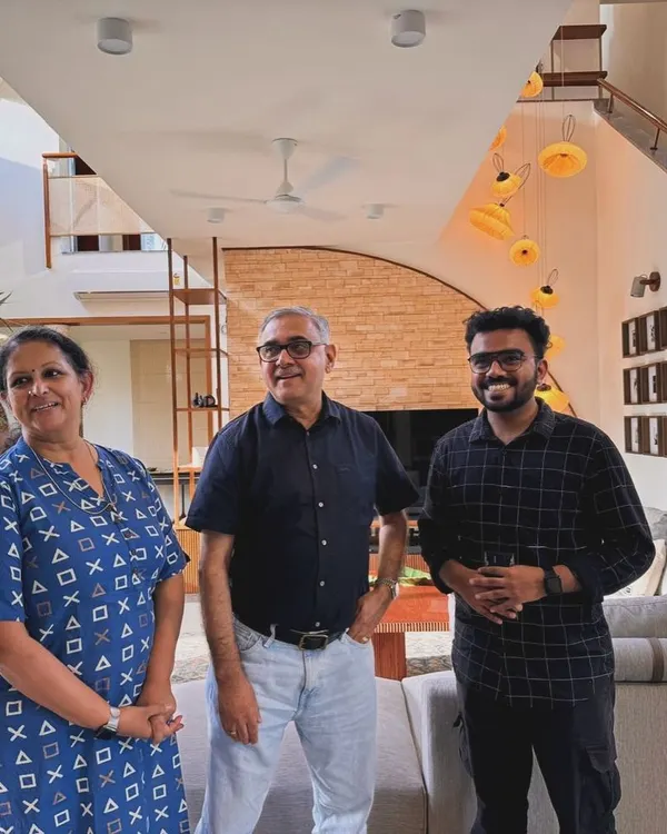 A proud moment as we hand over a newly completed home to our clients in Bengaluru. Seeing their joy makes the entire process worthwhile. We are pictured here with our clients and our project architect.