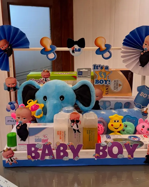Create precious memories with my lovingly curated baby hampers. This "Baby Boy" hamper is themed around Boss Baby and includes a plush elephant, Sebamed products, and other essentials.