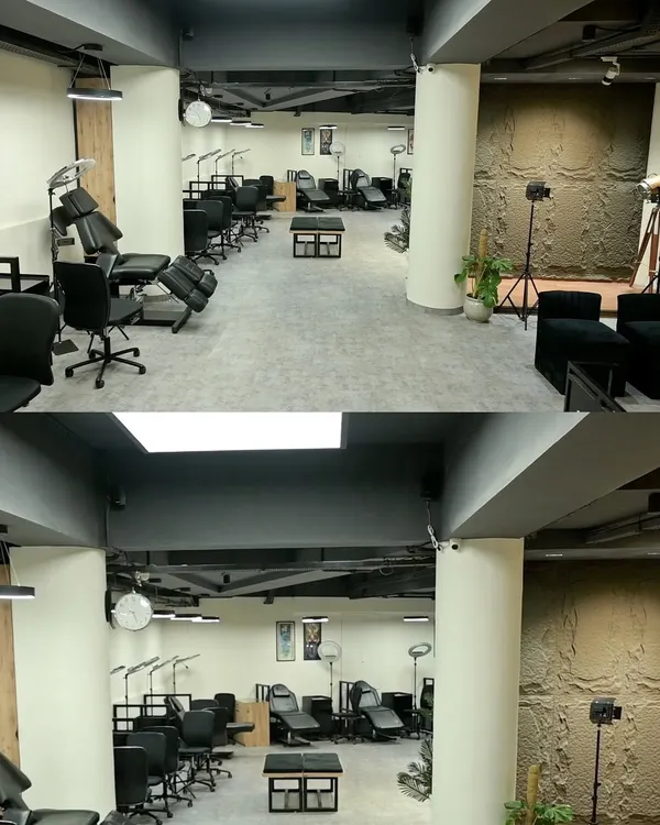 A wide view of my tattoo studio floor. Each station is fully equipped and spaced out to provide a private and professional environment for every client.