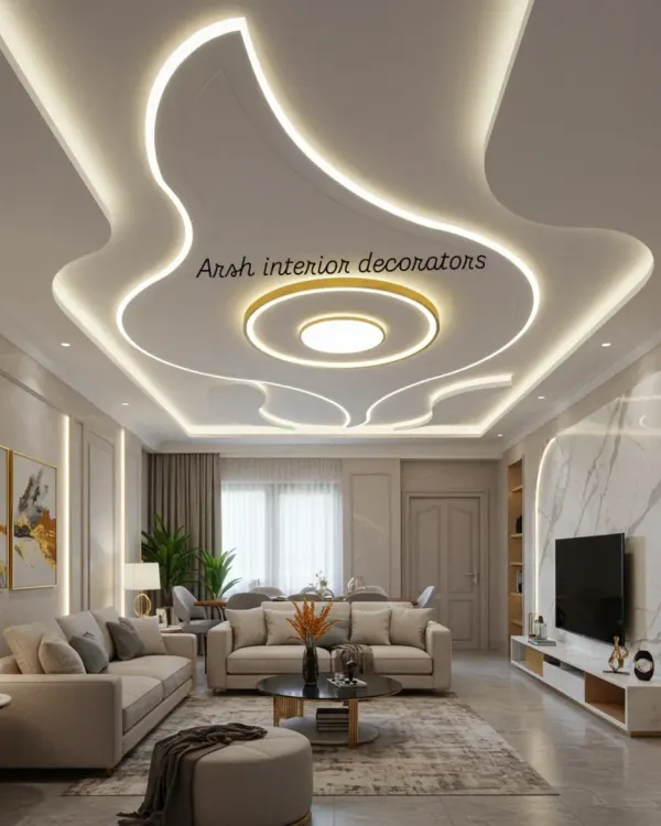 This is the kind of grand statement a living room deserves. I designed this flowing, multi-layered false ceiling with integrated cove lighting to create a luxurious and spacious feel, making it the centerpiece of the entire home.