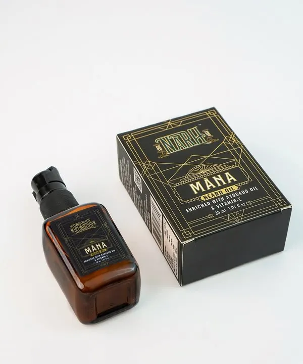 A classic e-commerce shot for a men's grooming brand, featuring the product and its packaging. The clean, white background ensures the focus is entirely on the product.