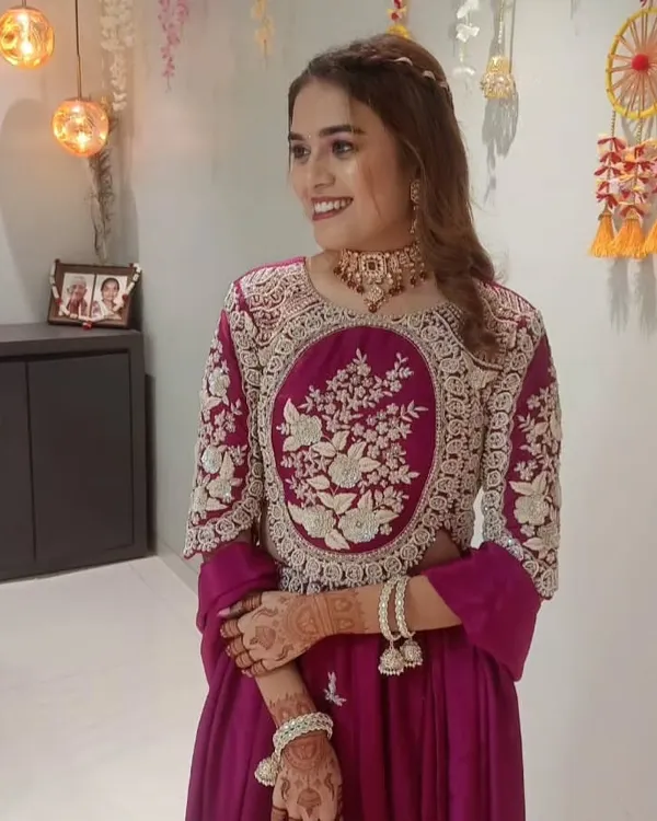 A happy client looking lovely for a festive occasion. She paired her embroidered outfit with a custom choker and matching bracelets from my collection.