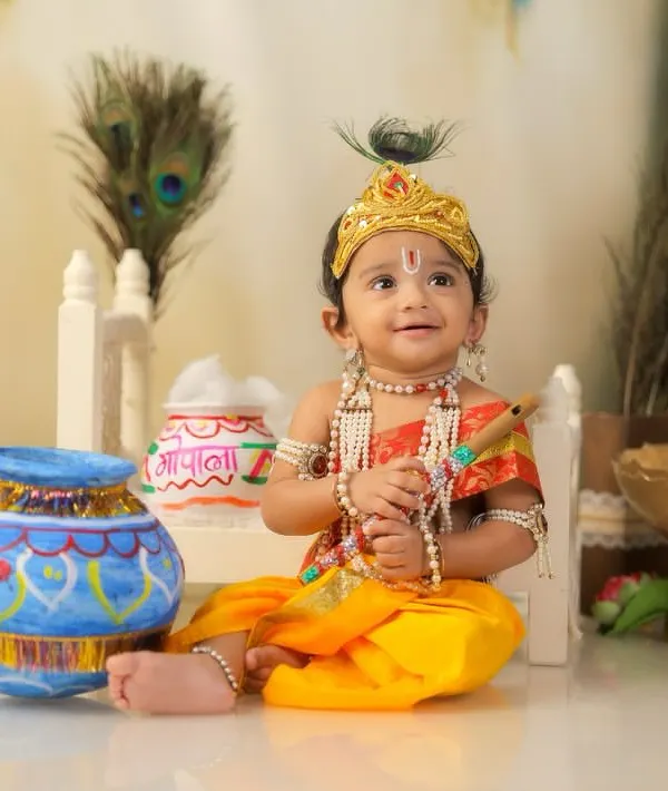 I love bringing our culture to life, and this Nanha Kanha (Little Krishna) shoot is one of my favorites. We create a complete divine setting with peacock feathers, a little crown, and traditional attire to capture these pure, joyful smiles.