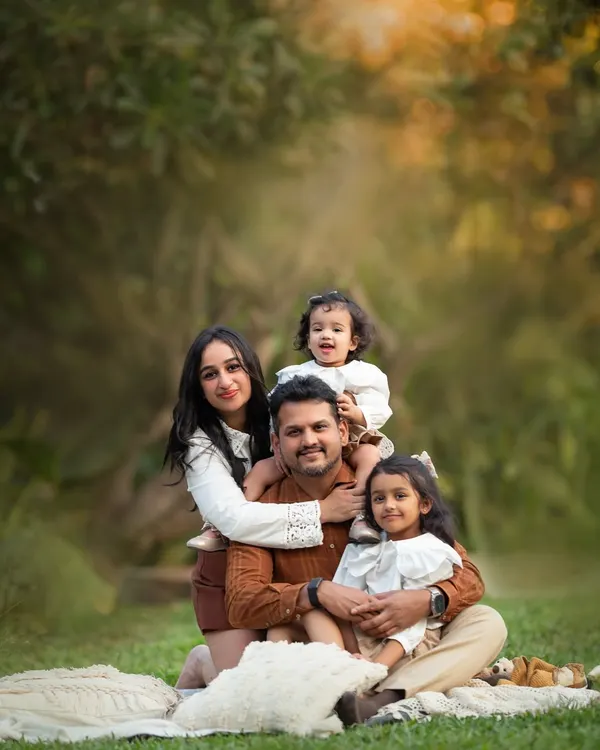 The classic family portrait, but make it relaxed and full of love. We found a perfect spot on the grass for this family of four to snuggle up together during their outdoor session.