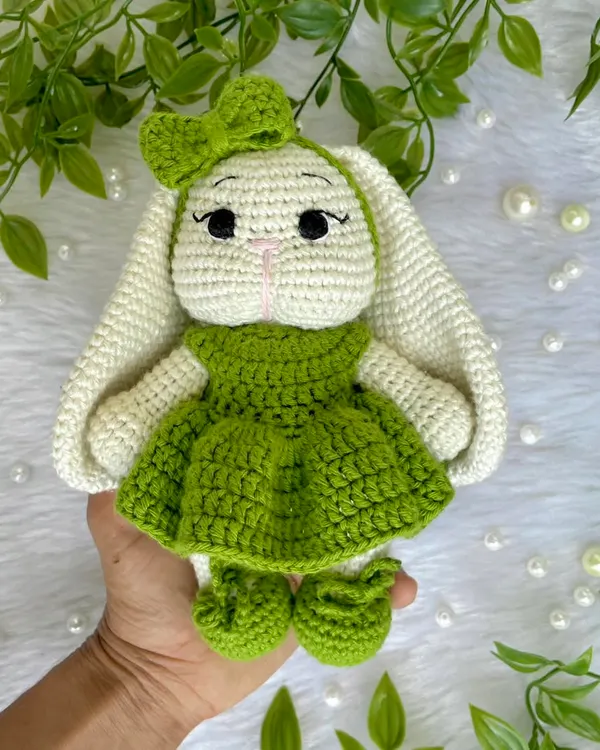 Look at this adorable bunny with her long, floppy ears and sweet green dress! I love when customers have unique ideas, and this long-eared bunny was a joy to bring to life. She is so soft and posable.