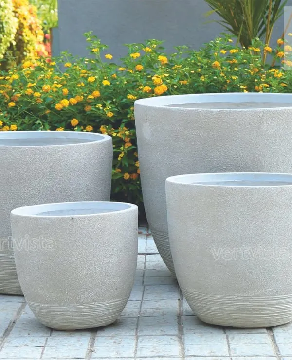 Our ROUGH STONE series features planters with a subtle, stone-like texture, perfect for outdoor landscapes and patios. These lightweight yet sturdy FRP planters are available in various sizes to suit everything from small shrubs to large statement plants.