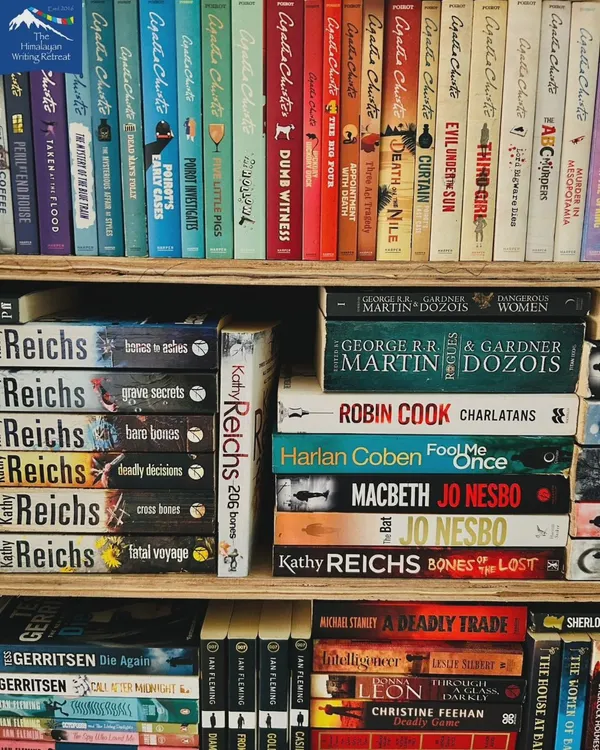 A peek at just one of the six shelves from our in-house bookworm's personal collection. Our library is curated with love and packed with gems for you to discover.