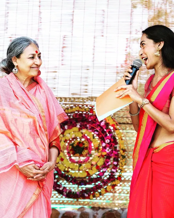 A beautiful, candid moment interacting with a guest. My goal is always to connect with everyone in the room, making them feel like part of the celebration. This is what I mean when I say I'm in the crowd, not just on the stage.