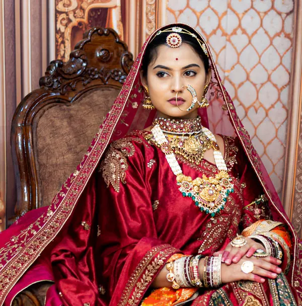 For brides who dream of a regal, majestic look, we offer styled portrait sessions. This image, inspired by royal aesthetics, showcases our ability to capture intricate details in bridal wear, jewelry, and expression, creating a timeless piece of art.